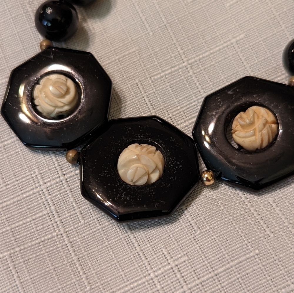 Vintage black beaded necklace with carved off white rose details